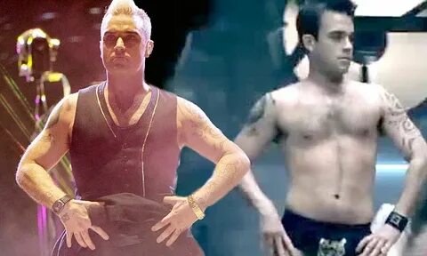 Robbie Williams shows off his Rock DJ tiger motif underpants