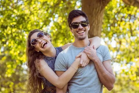 Cute couple in the park Stock Photo by © Wavebreakmedia 7642