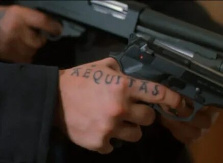 "Aequitas" ("justice" in Latin), hand tattoo, guns, Murphy. 