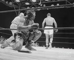 Archie Moore Holding Onto The Ropes by Bettmann