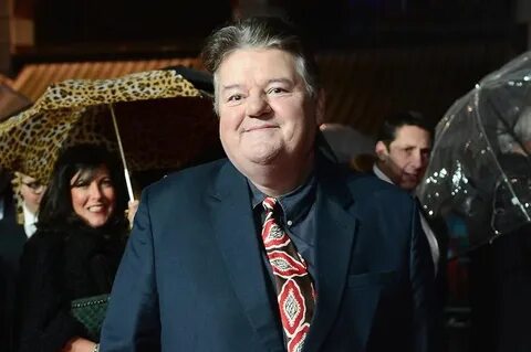 Harry Potter star Robbie Coltrane appears in wheelchair as h