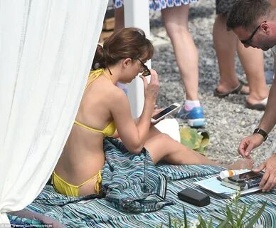 Dakota Johnson goes topless while filming racy Fifty Shades 