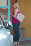 Melissa Joan Hart Waiting for a coffee at Starbucks in Bever