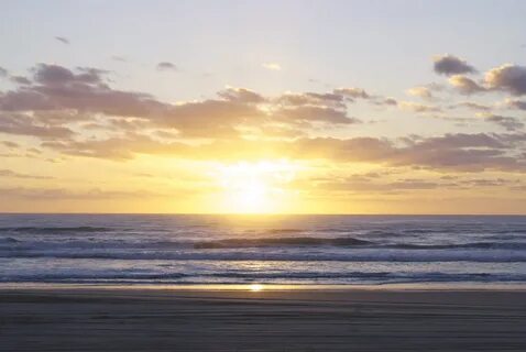 Watching the sunrise on the East Coast. Meriel and Jack In O