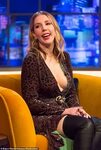 Pregnant Katherine Ryan shows off baby bump in bright green 