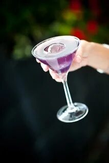 purple martini with sphere ice Purple drinks, Raspberry liqu