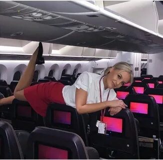 21 Slightly Racy Photos Of The Hottest Female Cabin Crew The