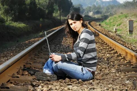 Men waiting for the train stock image. Image of jeans - 8290