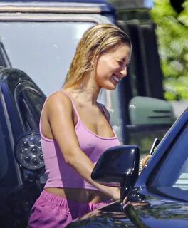 HAILEY BIEBER in a Pink Top and Shorts Out in Beverly Hills 
