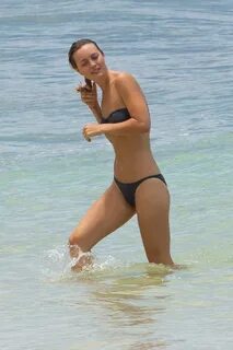Sean Penn, 57, hits the beach with his bikini-clad actress g