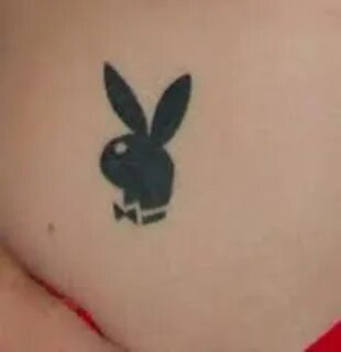 Blonde with playboy bunny tattoo on each boob