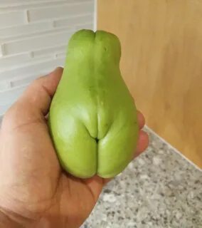 A pear that looks like it has legs and a vulva. zj_y33t / Via. reddit.com. 