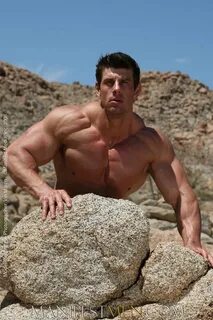 Muscular men Zeb posing outdoors