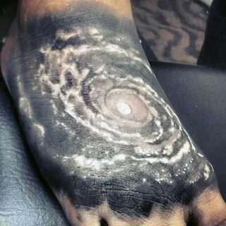 Stunning big black and white galaxy tattoo on foot - Tattooi