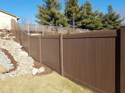 Beautiful Chestnut Brown Woodland Select Fence. - AmeriFence