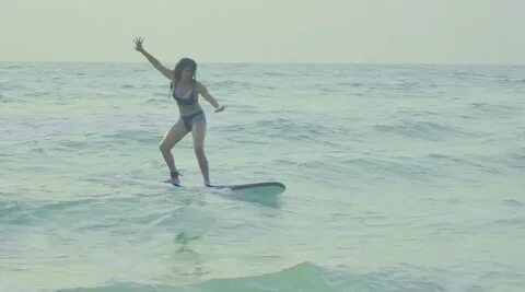 Water Baby: TMKOC fame Nidhi Bhanushali enjoys surfing in a 
