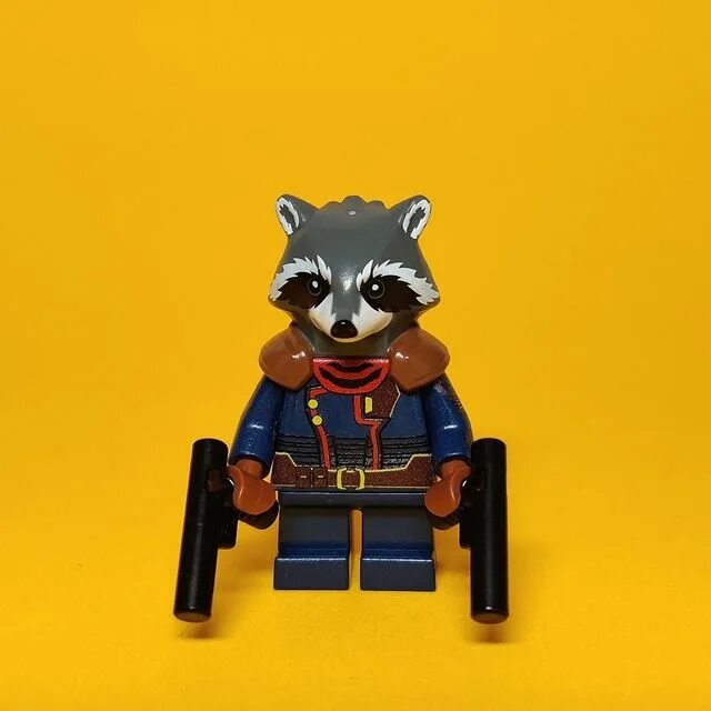 "Oh, I’ll Get That Arm." (c) Rocket Raccoon Rocket is depicted as...