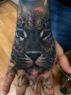 Realistic Leopard Hand Piece Best tattoo design ideas Leopar