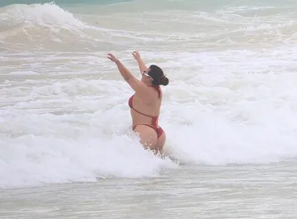CHIQUIS RIVERA in a Red Bikini at a Beach in Tulum 01/22/202