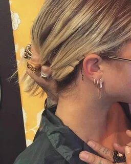 "Richie" tattoo behind the right ear of Sofia Richie. Tattoo