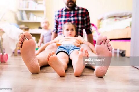 Daddy Feet Stock Pictures, Royalty-free Photos & Images - Ge