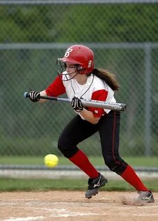 Softball, Female player with Bat at ball free image download