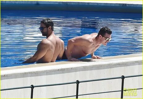 Luke Evans Shows Off His Shirtless Body In the Pool with Vic