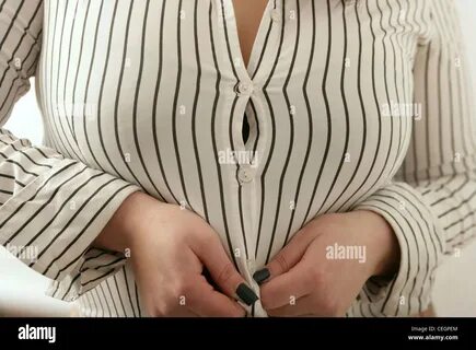 Tight Shirt Buttons High Resolution Stock Photography and Images - Alamy.