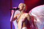 Miley Cyrus topless wearing butterfly pasties and pantyhose 