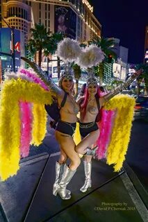 2 Showgirls On The Strip After Dark Across from Planet Hol. 