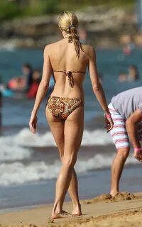Brooke Burns flaunts her bikini body