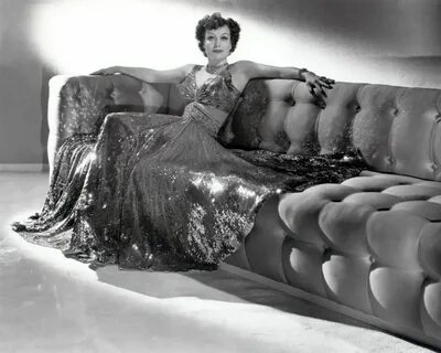 Joan Crawford screen fashion designed by Adrian, Crawford as