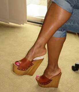 Ebony wearing wedges heels