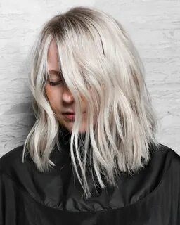 The perfect platinum blonde with subtle shadow root by @bala