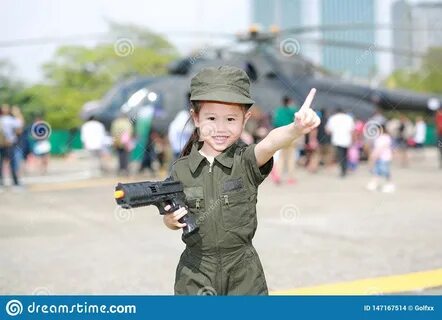 Asian girl in pilot soldier suit