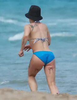 Pink showing off her hot bikini body at the beach in Miami