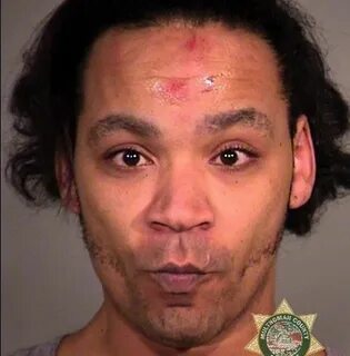 Gresham man claims he shot through apartment wall to scare '