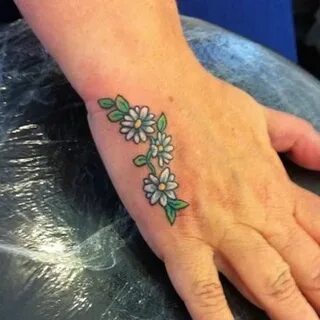 30 Small Daisy Tattoo Design Ideas with Meanings Daisy tatto