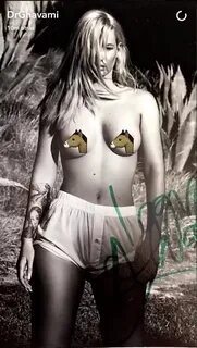 Iggy Azalea Gifts Plastic Surgeon Signed Topless Photo - GQ