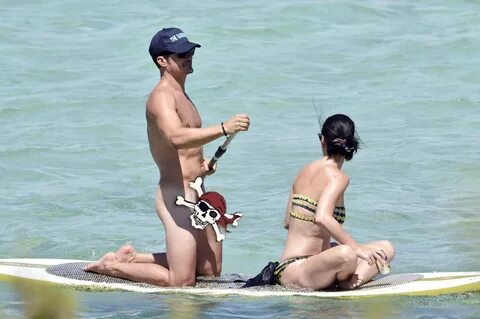 See Orlando Bloom NAKED paddle boarding with girlfriend Katy