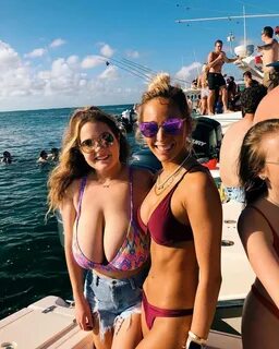 Insane tits falling out her bikini.