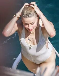 Amber Heard tits and ass in a sexy white swimsuit seen by pa