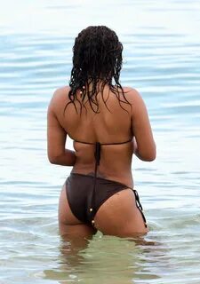 Christina Milian in Black Bikini on Miami Beach. 