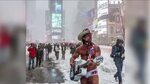 Naked Cowboy takes to Times Square in the middle of the bliz