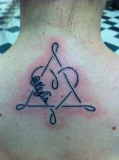 Adoption symbol tattoo. The triangle symbolizes the child, b