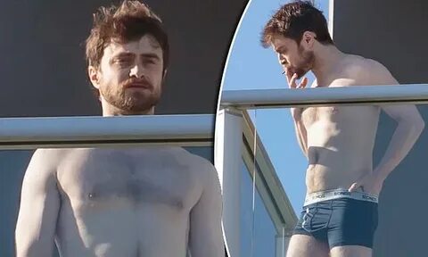 Daniel Radcliffe enjoys a cigarette in his underwear on his 