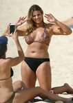 Fiona Falkiner Shows off her curves in a bikini with her par