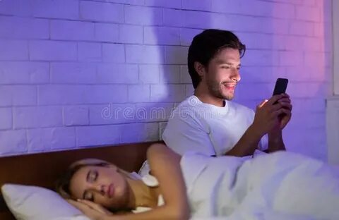 Cheating Boyfriend Texting on Cellphone while Girlfriend Sle
