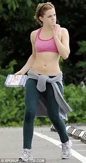 Emma Watson shows off her toned midriff in stomach-baring cr