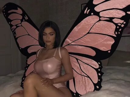Kylie Jenner Dressed Like a Giant Pink. kylie and stormi butterfly costume....